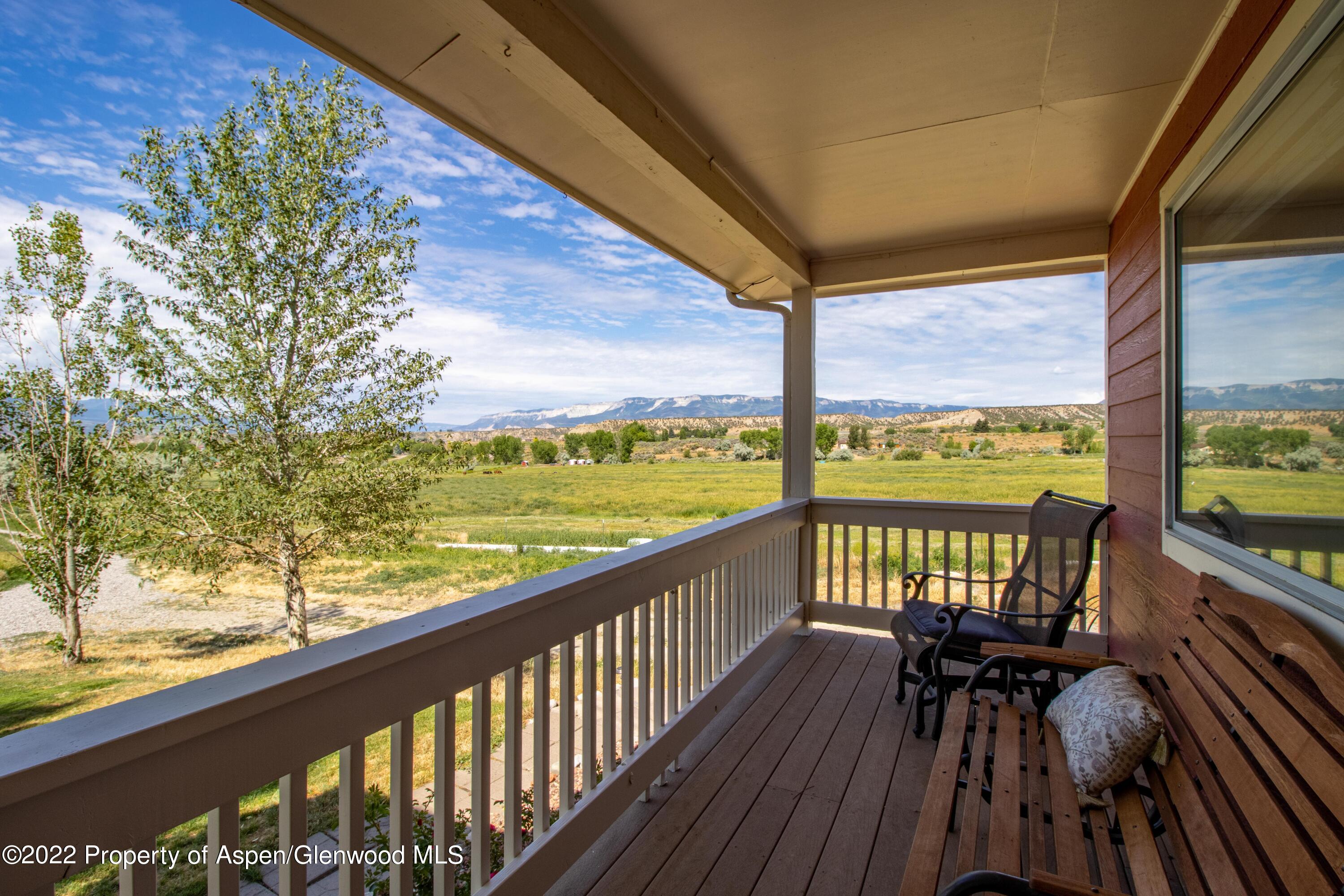 1450 County Road 259 Rifle, CO 81650 - Photo 3 of 28 covered front porch