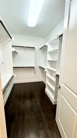 a bathroom with a double vanity sink mirror and
