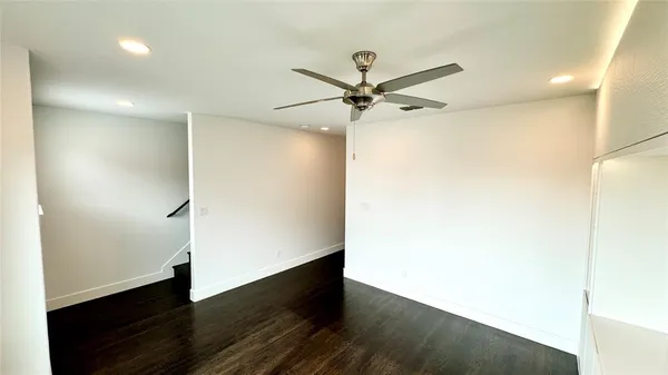 a balcony view with a seating space