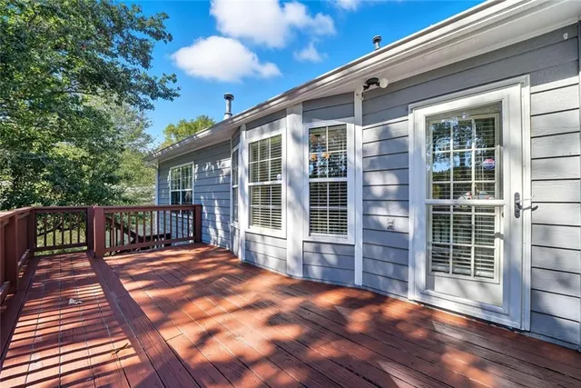 a view of a backyard with a deck