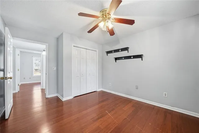 a bathroom with a bathtub shower sink and toilet