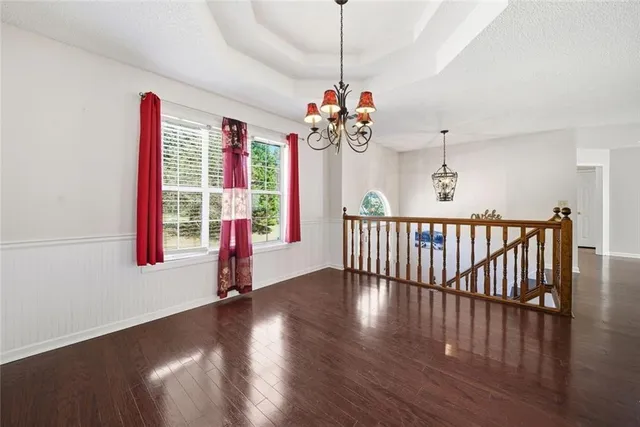 a kitchen with stainless steel appliances granite countertop a stove refrigerator sink and cabinets