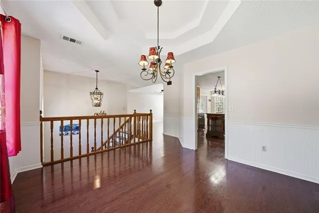 a kitchen with stainless steel appliances granite countertop a stove and a sink
