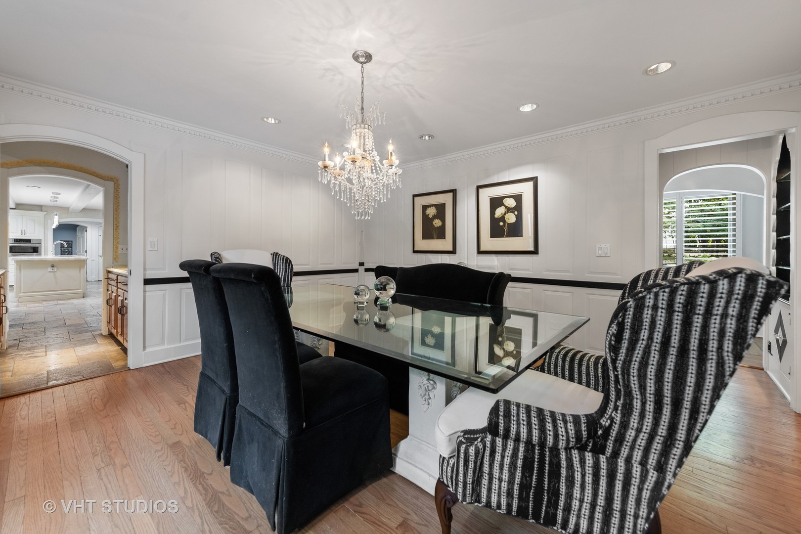3423 Spring Road Oak Brook, IL 60523 - Photo 13 of 75 a view of a dining room with furniture and chandelier