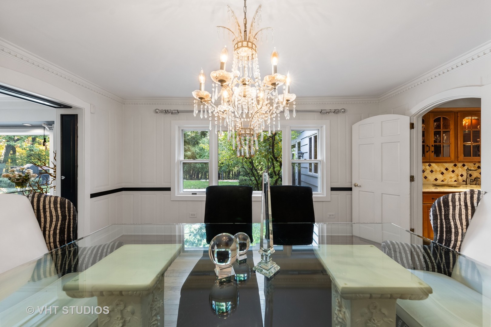 3423 Spring Road Oak Brook, IL 60523 - Photo 15 of 75 a view of a dining room with furniture window and outside view