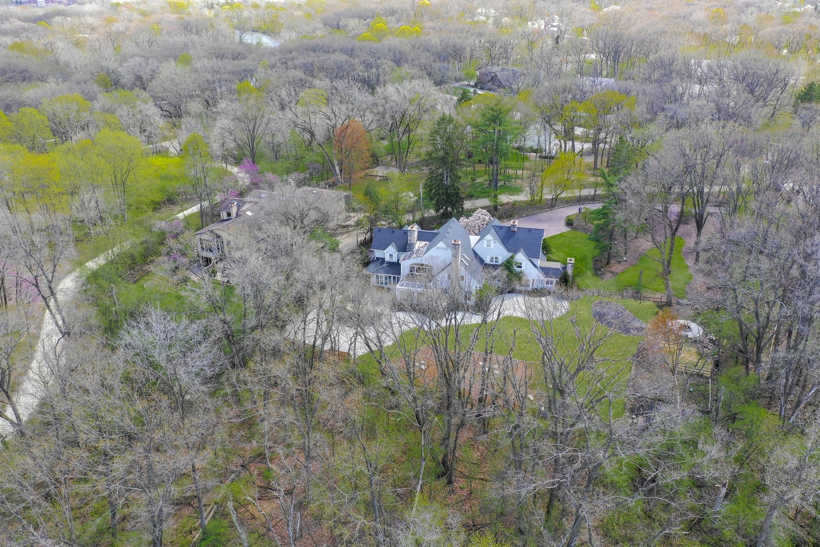 3423 Spring Road Oak Brook, IL 60523 - Photo 2 of 75 a view of swimming pool and mountain in the back