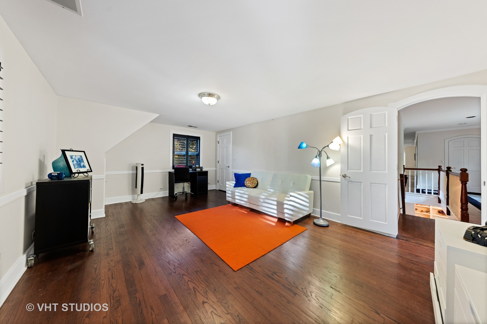 3423 Spring Road Oak Brook, IL 60523 - Photo 32 of 75 a living room with furniture and a wooden floor