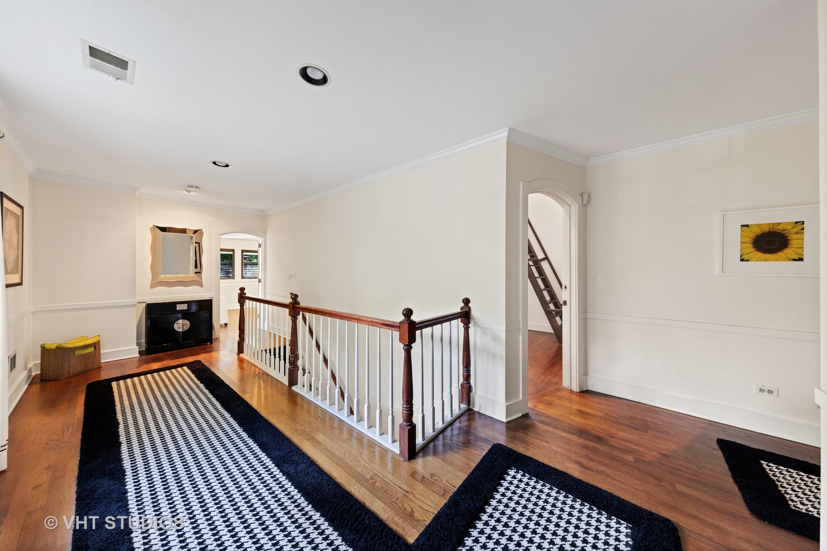 3423 Spring Road Oak Brook, IL 60523 - Photo 33 of 75 a view of a hallway with the wooden floor and staircase