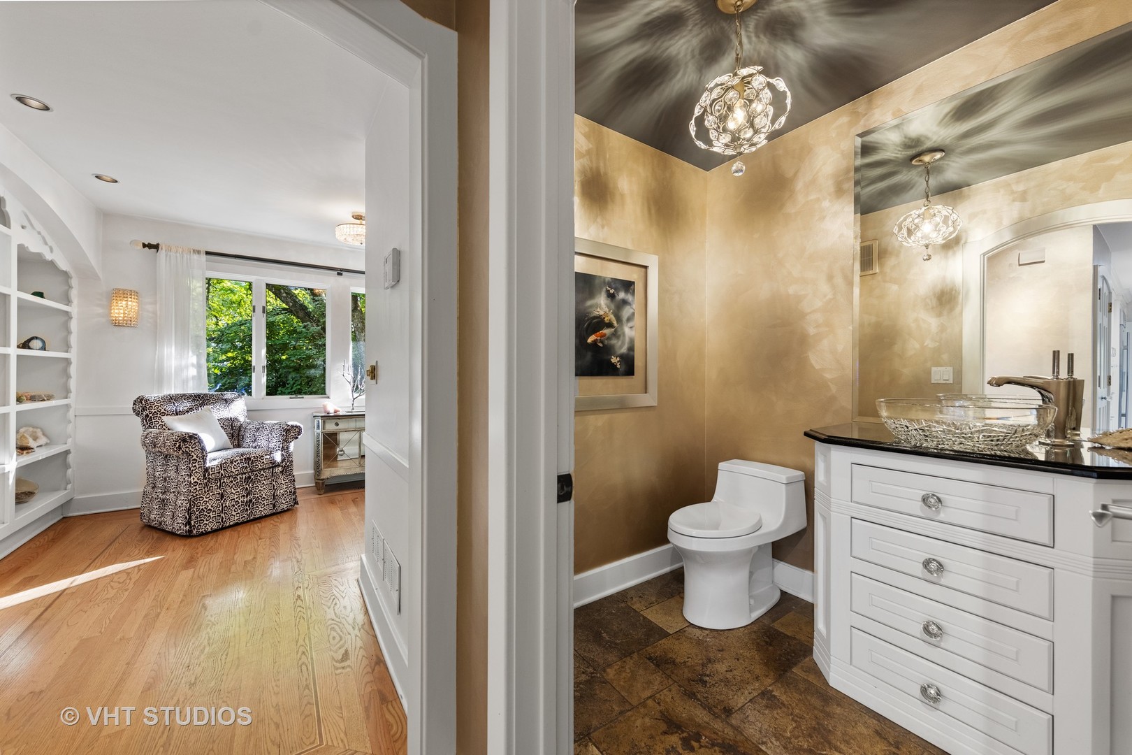 3423 Spring Road Oak Brook, IL 60523 - Photo 34 of 75 a bathroom with a toilet sink and mirror