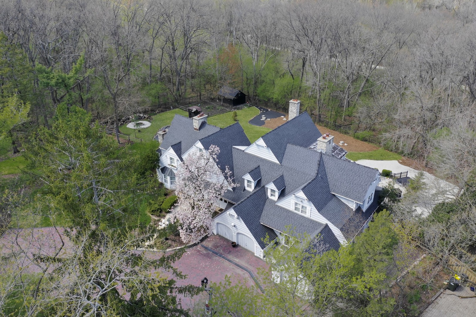 3423 Spring Road Oak Brook, IL 60523 - Photo 47 of 75 an aerial view of a house with a garden