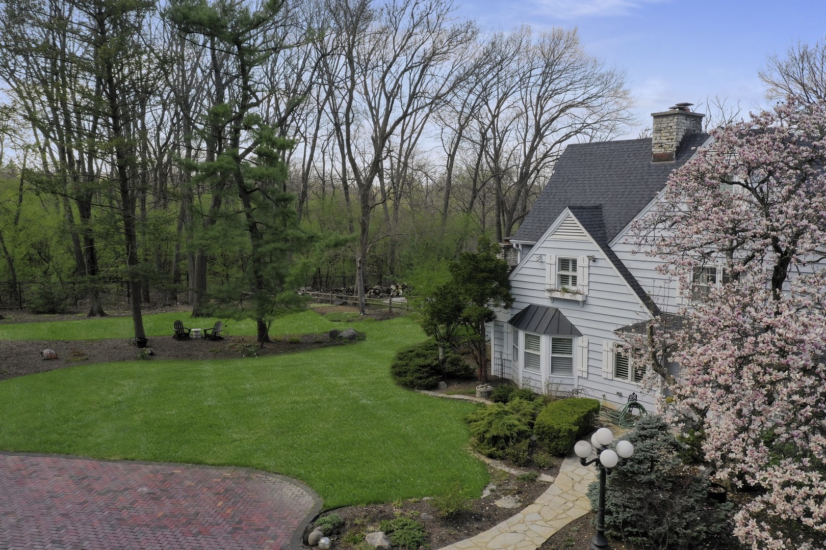 3423 Spring Road Oak Brook, IL 60523 - Photo 48 of 75 a aerial view of a house with a yard and potted plants