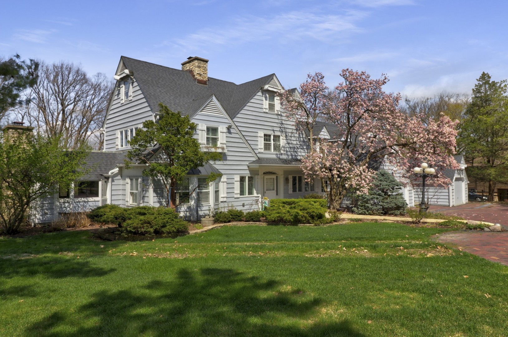 3423 Spring Road Oak Brook, IL 60523 - Photo 49 of 75 a front view of house with yard and green space
