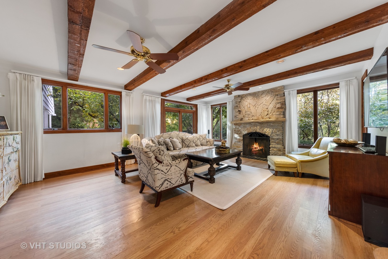 3423 Spring Road Oak Brook, IL 60523 - Photo 5 of 75 a living room with furniture fireplace and a large window