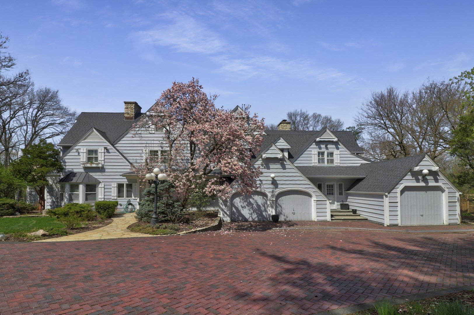 3423 Spring Road Oak Brook, IL 60523 - Photo 52 of 75 a front view of a house with garden