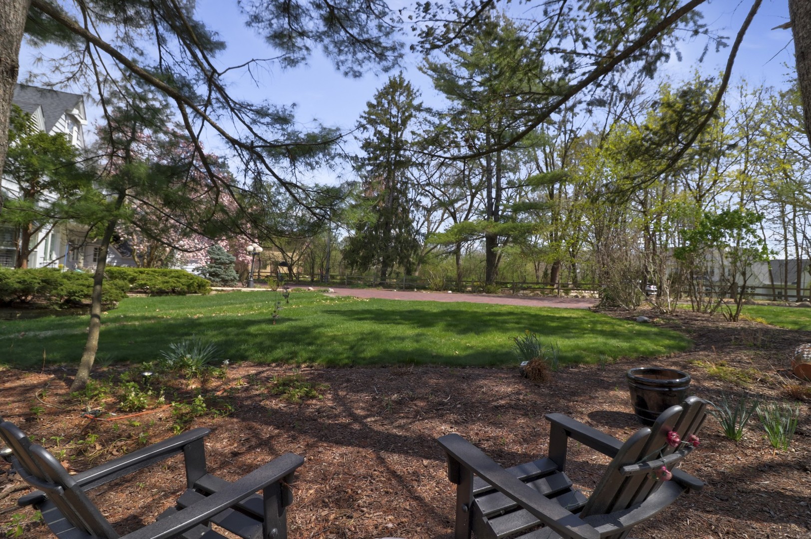 3423 Spring Road Oak Brook, IL 60523 - Photo 70 of 75 a view of backyard with seating area and green space