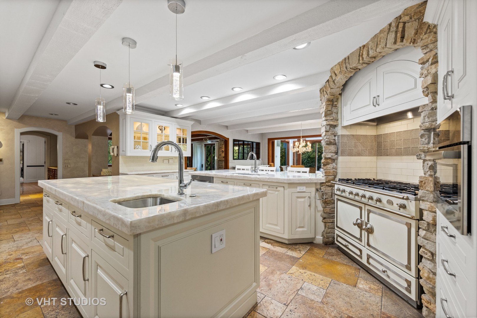 3423 Spring Road Oak Brook, IL 60523 - Photo 9 of 75 a kitchen with stainless steel appliances granite countertop a sink and a stove