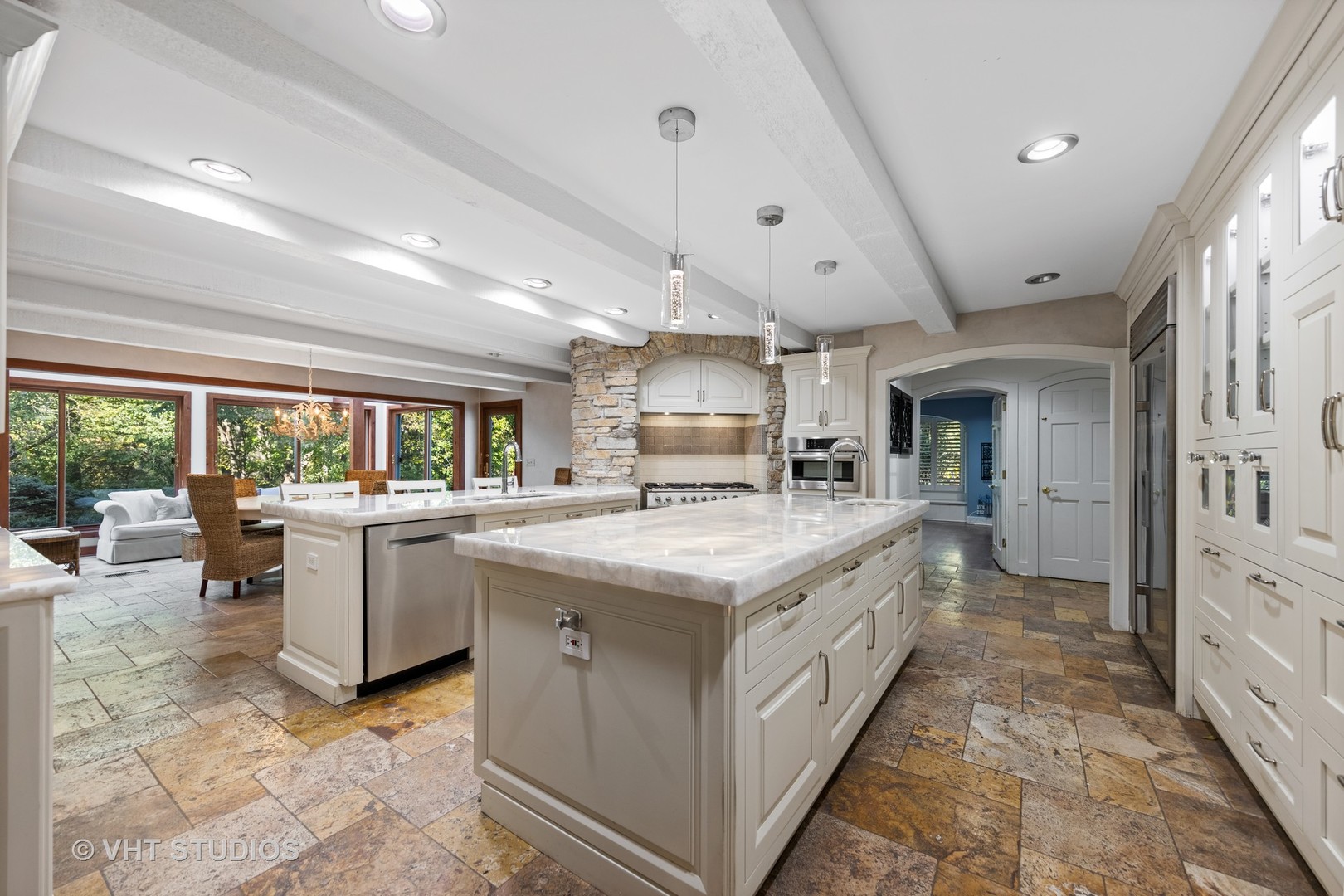 3423 Spring Road Oak Brook, IL 60523 - Photo 10 of 75 a large white kitchen with a large window