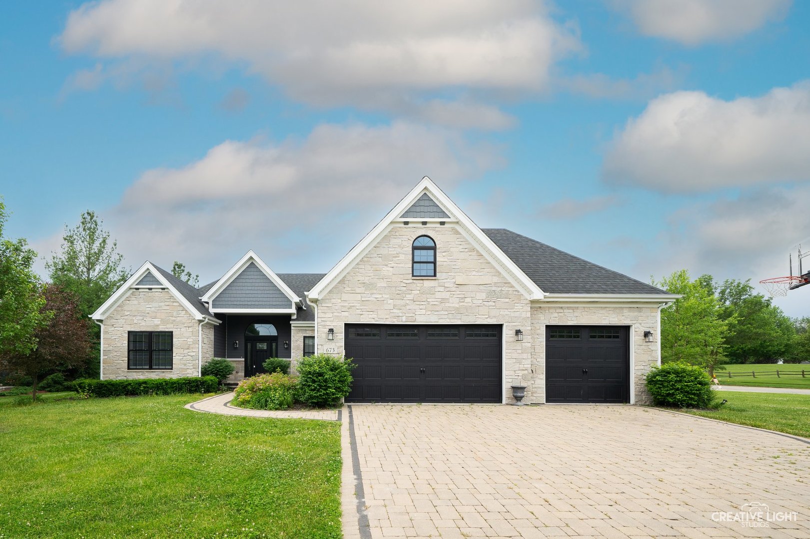 673 Greenfield Road Sugar Grove, IL 60554 - Photo 1 of 31 a front view of a house with yard and garage