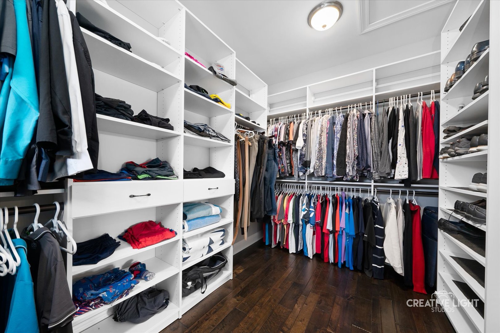 673 Greenfield Road Sugar Grove, IL 60554 - Photo 19 of 31 a view of walk in closet with clothes and shoes
