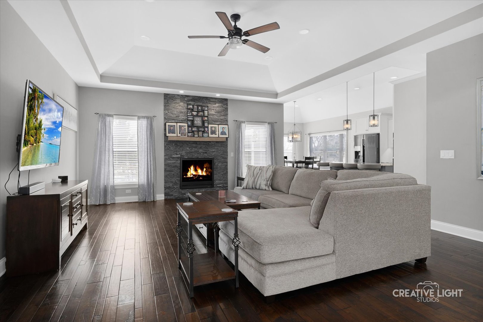 673 Greenfield Road Sugar Grove, IL 60554 - Photo 4 of 31 a living room with furniture fireplace and a flat screen tv