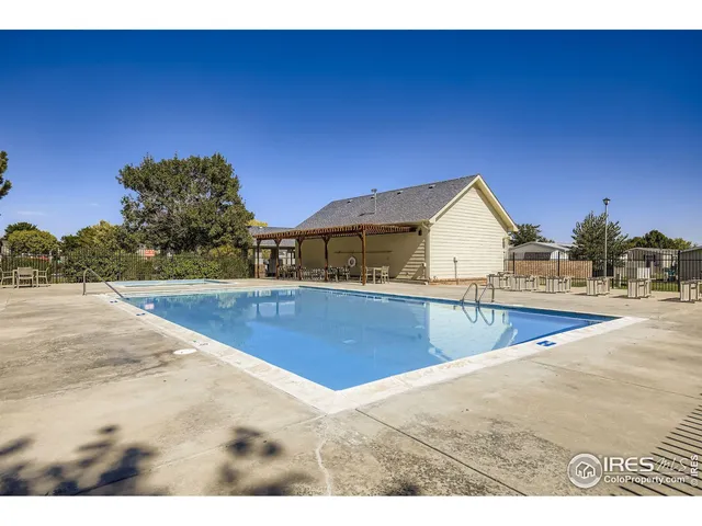 a view of outdoor space with playground and green space