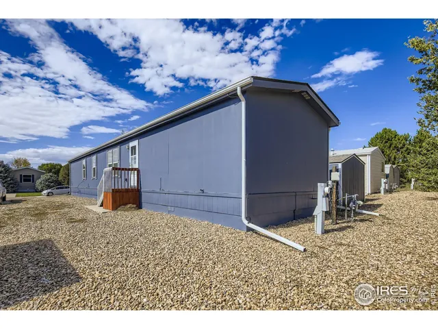 a black and white photo of a living room