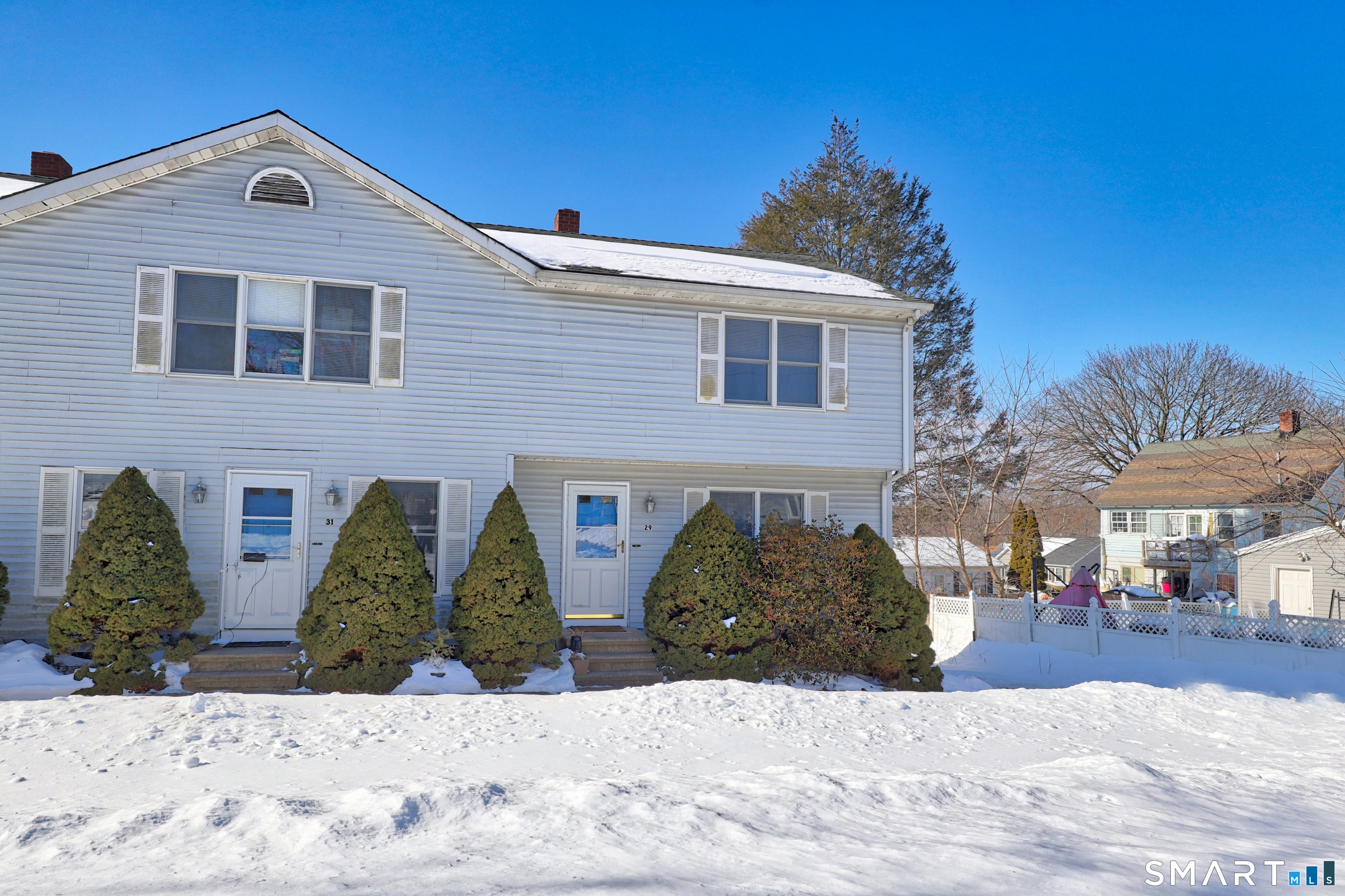 a view of a house with snow