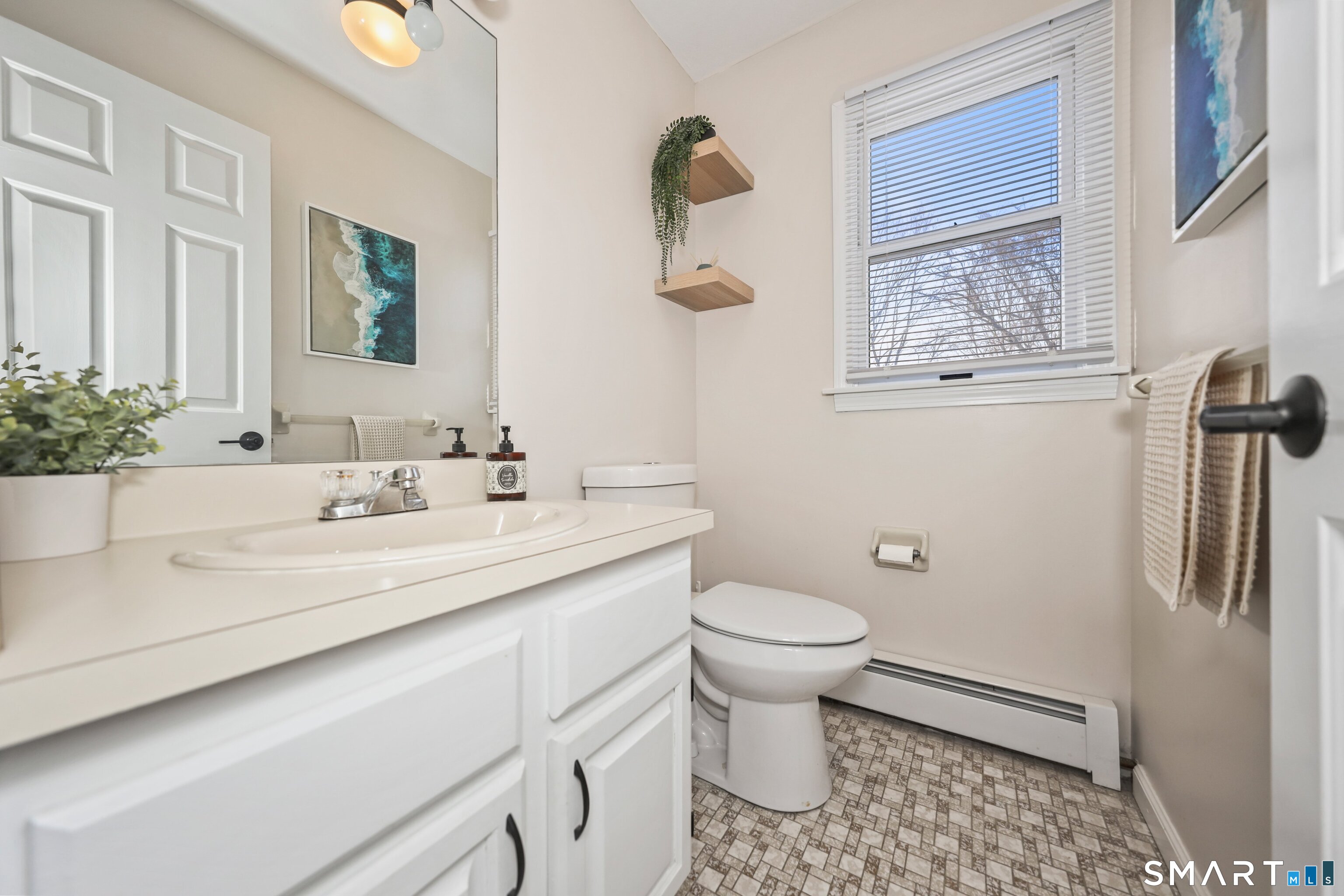 29 Toas Street, Unit 29 Shelton, CT 06484 - Photo 13 of 31 a bathroom with a sink toilet and shower