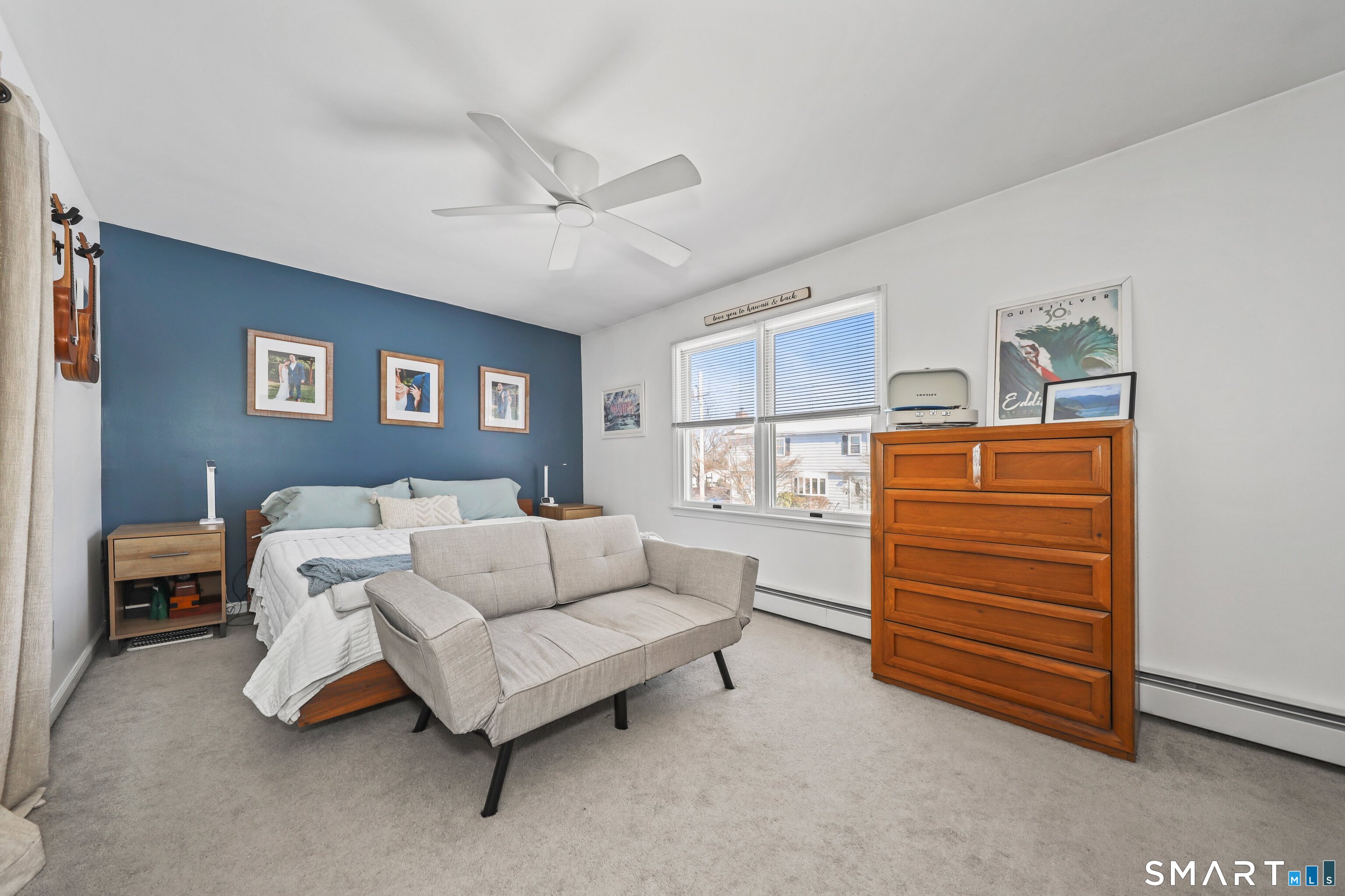 29 Toas Street, Unit 29 Shelton, CT 06484 - Photo 20 of 31 a living room with furniture and a dresser