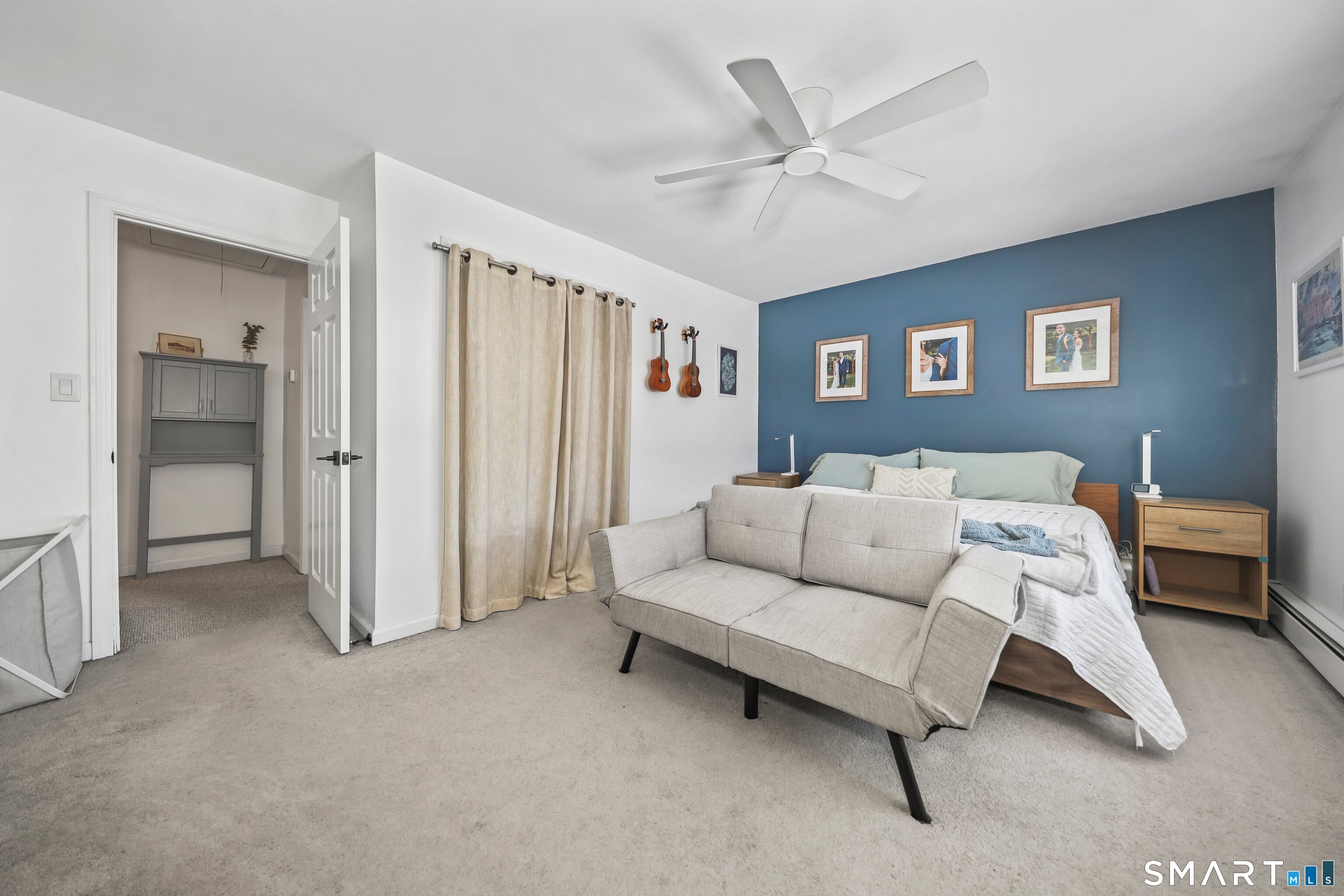 29 Toas Street, Unit 29 Shelton, CT 06484 - Photo 21 of 31 a bed room with a bed and a ceiling fan