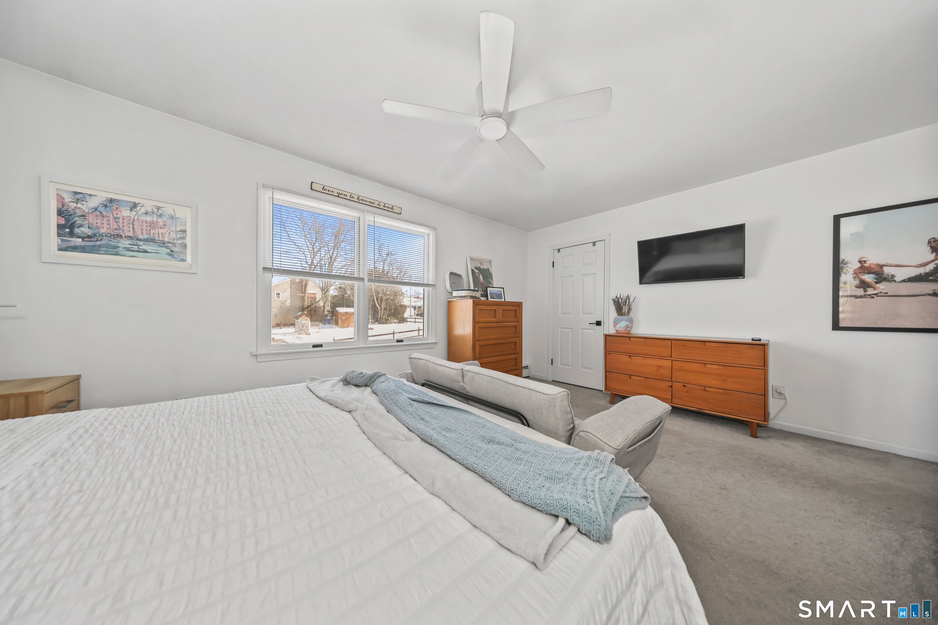 29 Toas Street, Unit 29 Shelton, CT 06484 - Photo 23 of 31 a bedroom with a bed couch and window