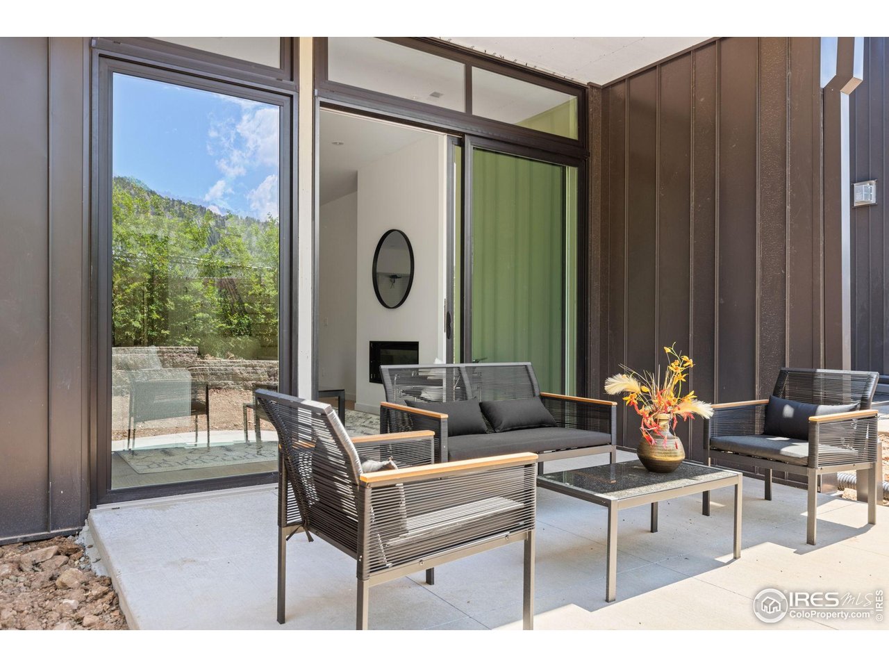 3315 Broadway Boulder, CO 80304 - Photo 10 of 42 a living room with furniture and a window