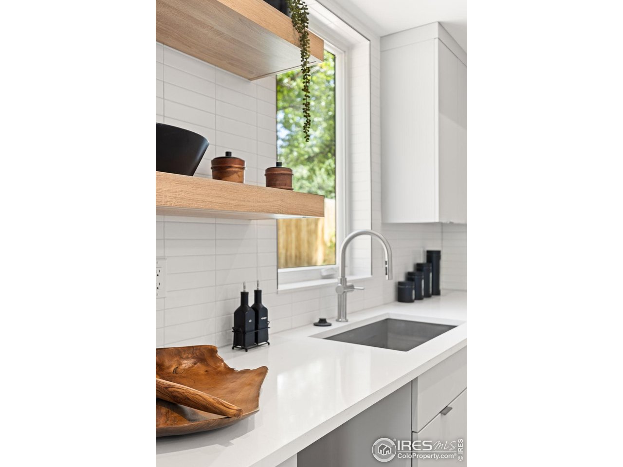 3315 Broadway Boulder, CO 80304 - Photo 3 of 42 a bathroom with a sink and a window