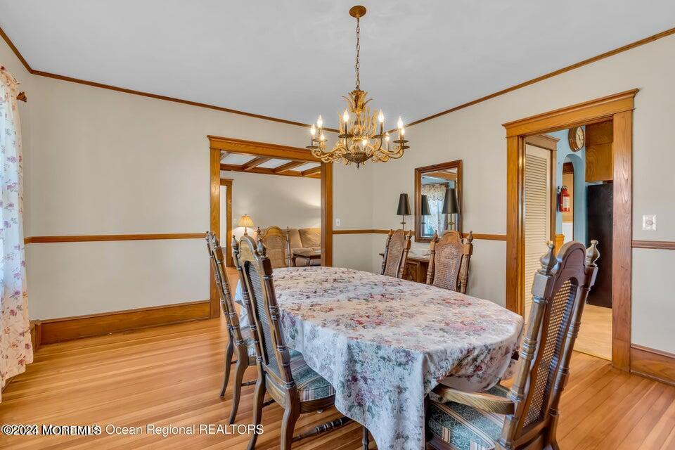 649 McClellan Street Long Branch, NJ 07740 - Photo 11 of 33 a view of a dining room with furniture window and wooden floor