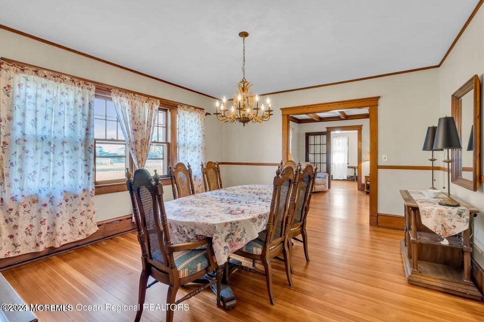 649 McClellan Street Long Branch, NJ 07740 - Photo 12 of 33 a view of a dining room with furniture window and wooden floor