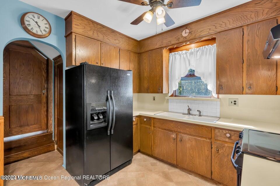 649 McClellan Street Long Branch, NJ 07740 - Photo 15 of 33 a kitchen with a refrigerator and a sink