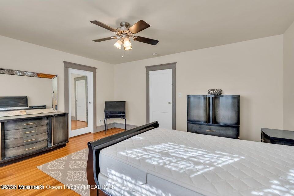 649 McClellan Street Long Branch, NJ 07740 - Photo 24 of 33 a bedroom with a bed and a television