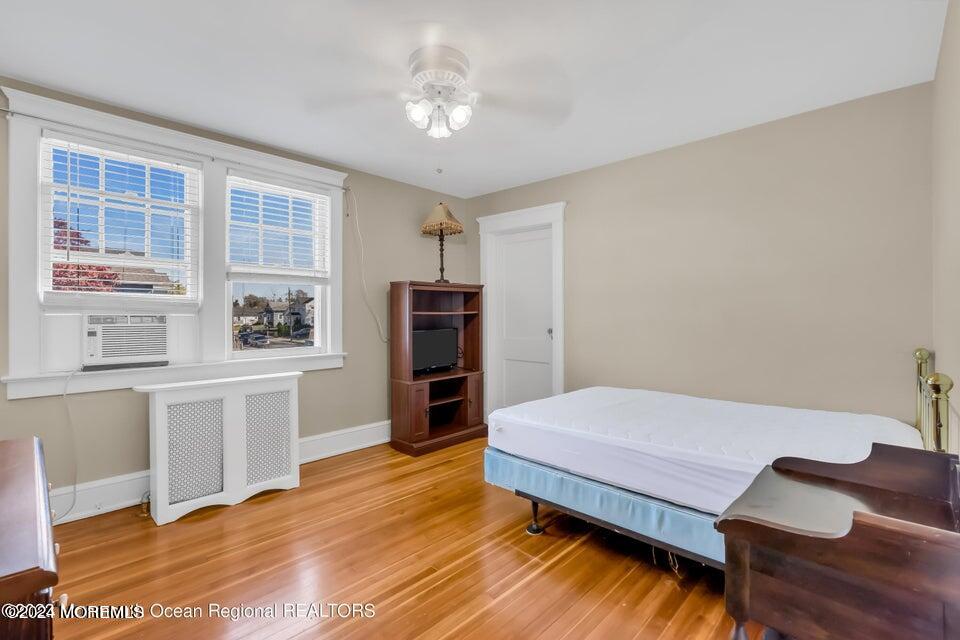 649 McClellan Street Long Branch, NJ 07740 - Photo 26 of 33 a bedroom with a bed and a desk