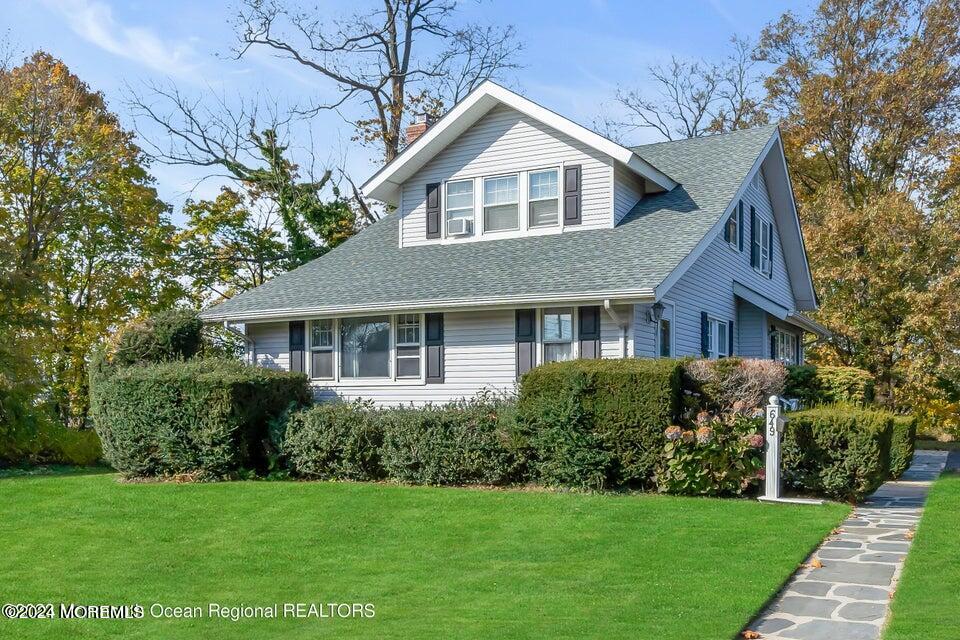 649 McClellan Street Long Branch, NJ 07740 - Photo 32 of 33 a front view of a house with a yard