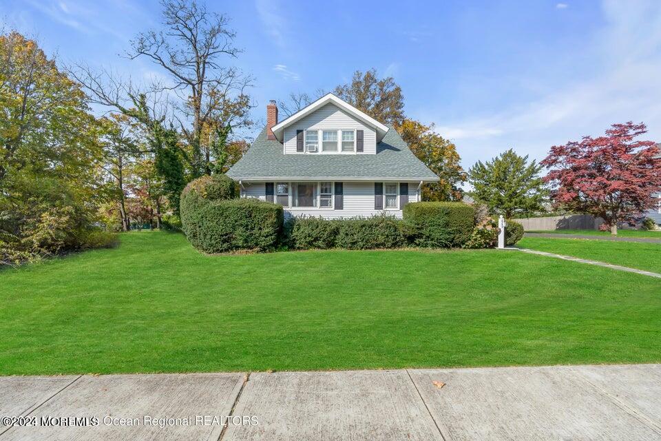 649 McClellan Street Long Branch, NJ 07740 - Photo 33 of 33 a front view of a house with a garden
