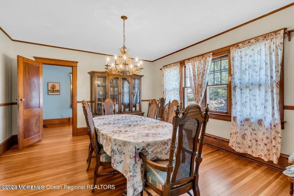 649 McClellan Street Long Branch, NJ 07740 - Photo 10 of 33 a view of a dining room with furniture window and wooden floor