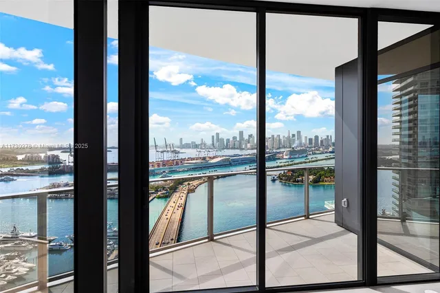 a view of a balcony next to a lake view