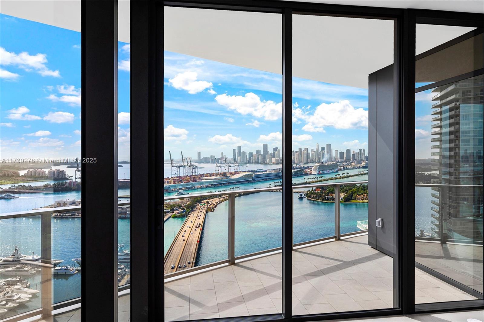 500 Alton Road, Unit 3101 Miami Beach, FL 33139 - Photo 18 of 53 a view of sky from window