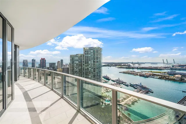 a view of a balcony with city