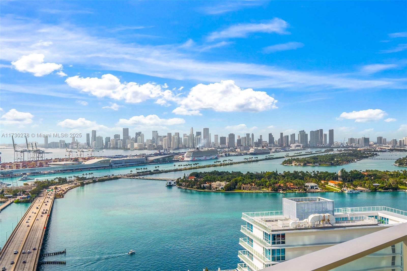 500 Alton Road, Unit 3101 Miami Beach, FL 33139 - Photo 24 of 53 a view of a city from a lake