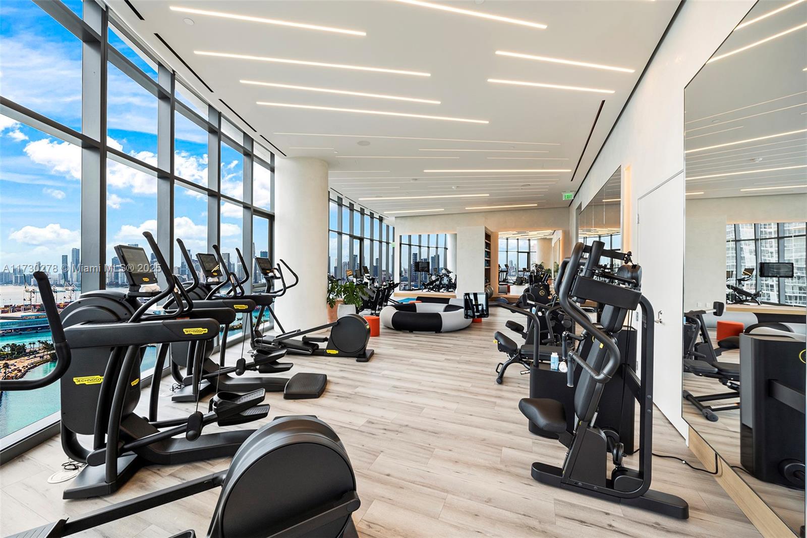 500 Alton Road, Unit 3101 Miami Beach, FL 33139 - Photo 29 of 53 a view of a room with gym equipment