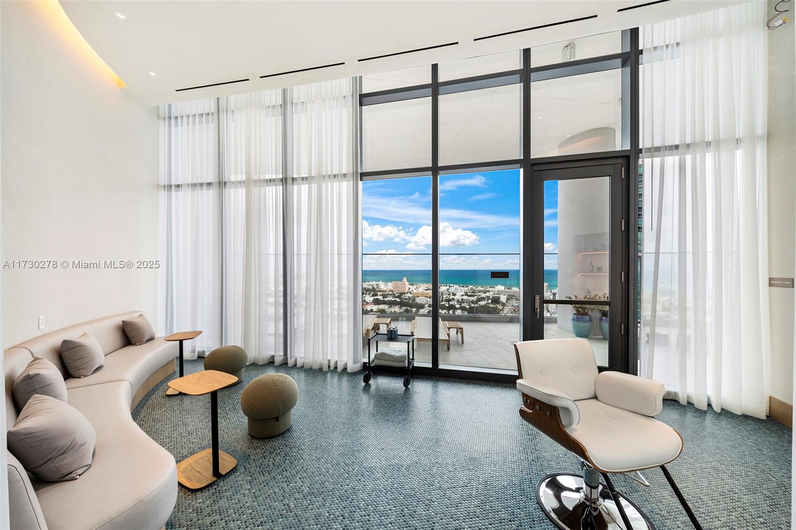 500 Alton Road, Unit 3101 Miami Beach, FL 33139 - Photo 35 of 53 a living room with furniture and floor to ceiling windows