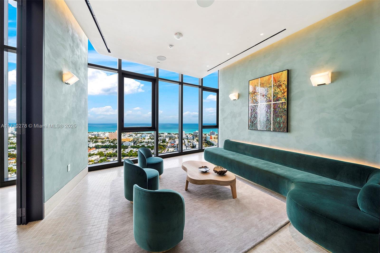 500 Alton Road, Unit 3101 Miami Beach, FL 33139 - Photo 38 of 53 a living room with furniture and floor to ceiling windows