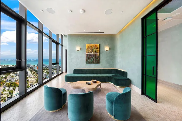 a view of a dining room with furniture window and outside view
