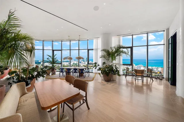 a reading room with furniture and window